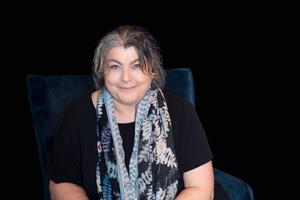 Bethany headshot - dark background.jpg